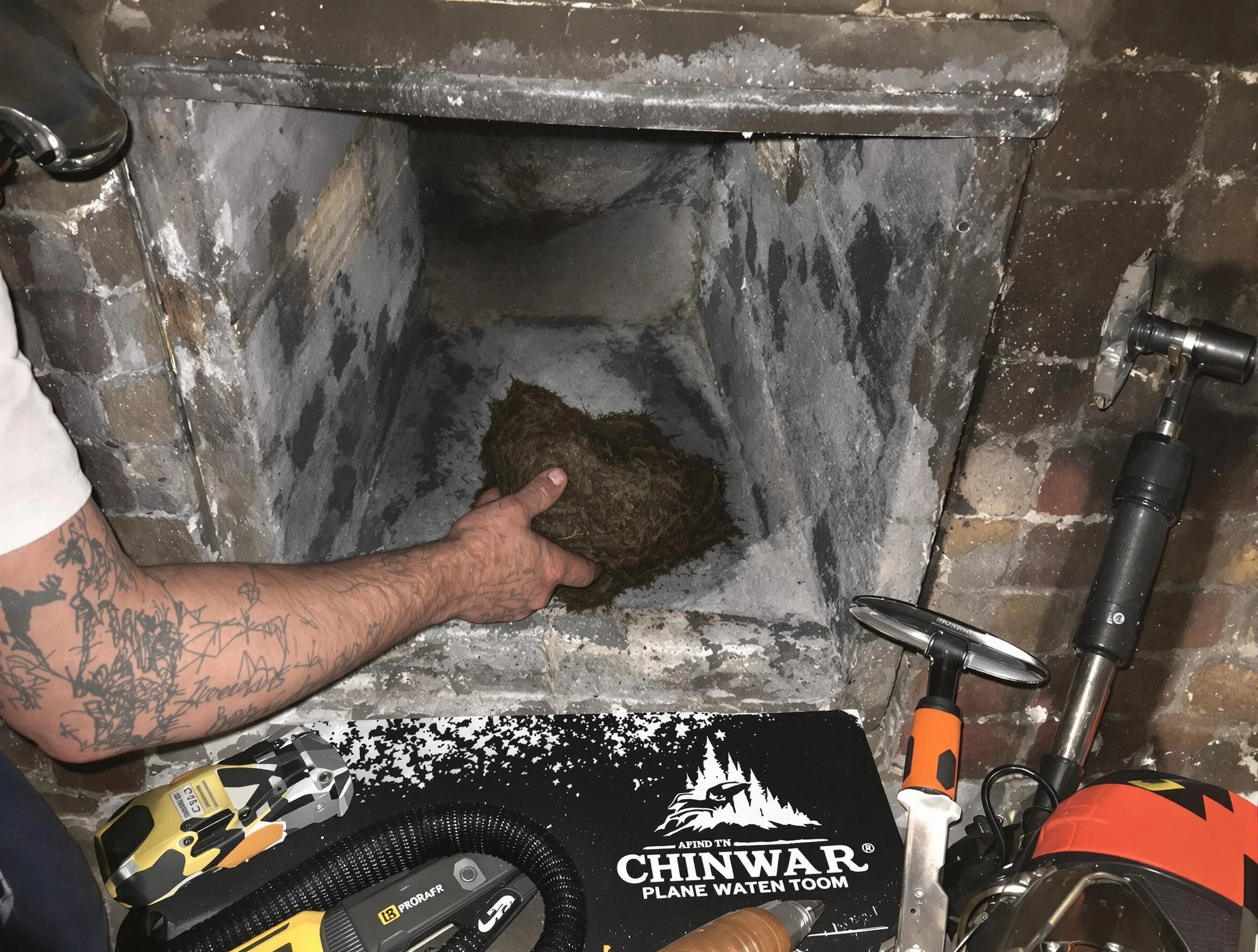 Panthersville Chimney Sweep safely removing debris and screening chimney in Panthersville, GA