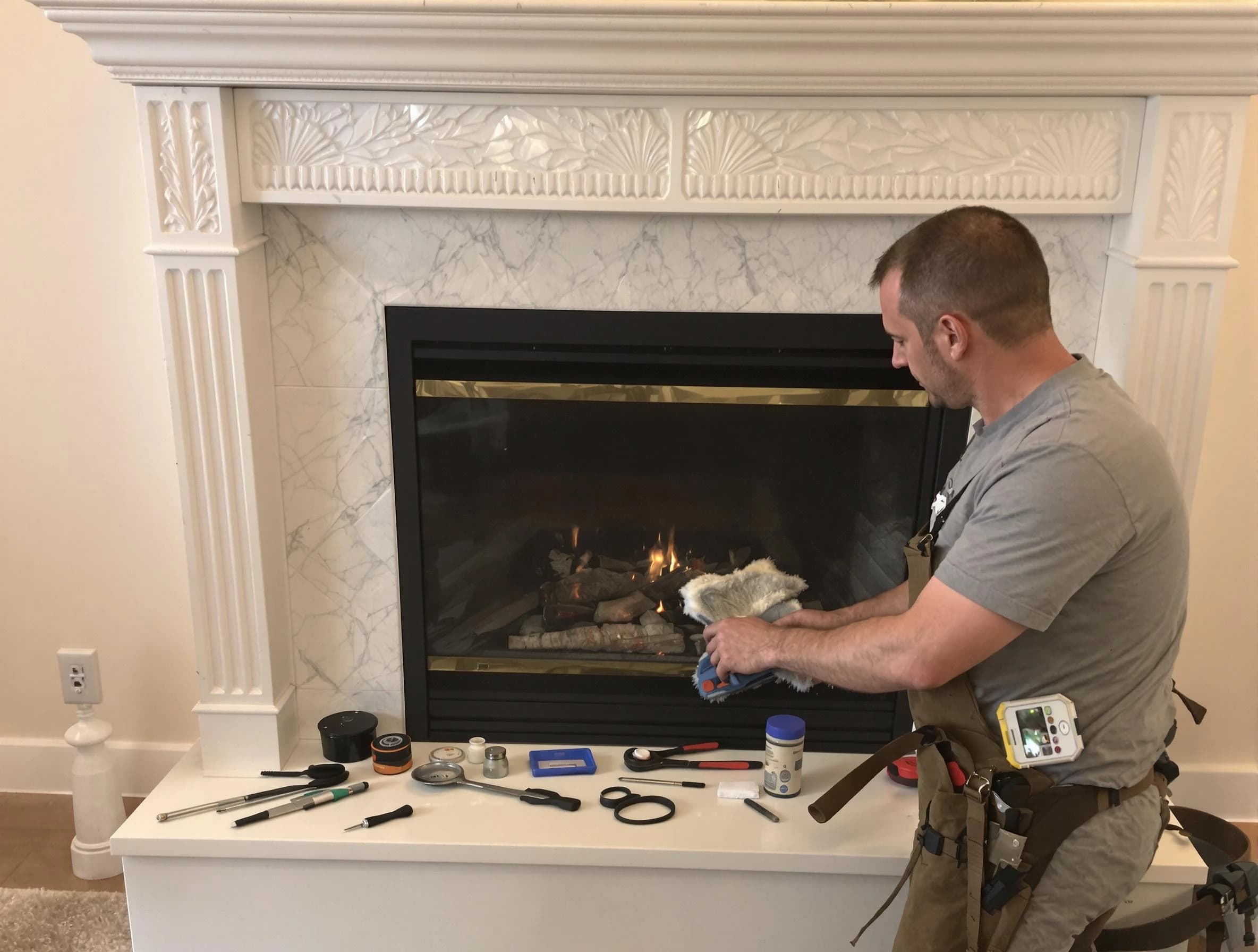 Panthersville Chimney Sweep performing fireplace maintenance in Panthersville, GA